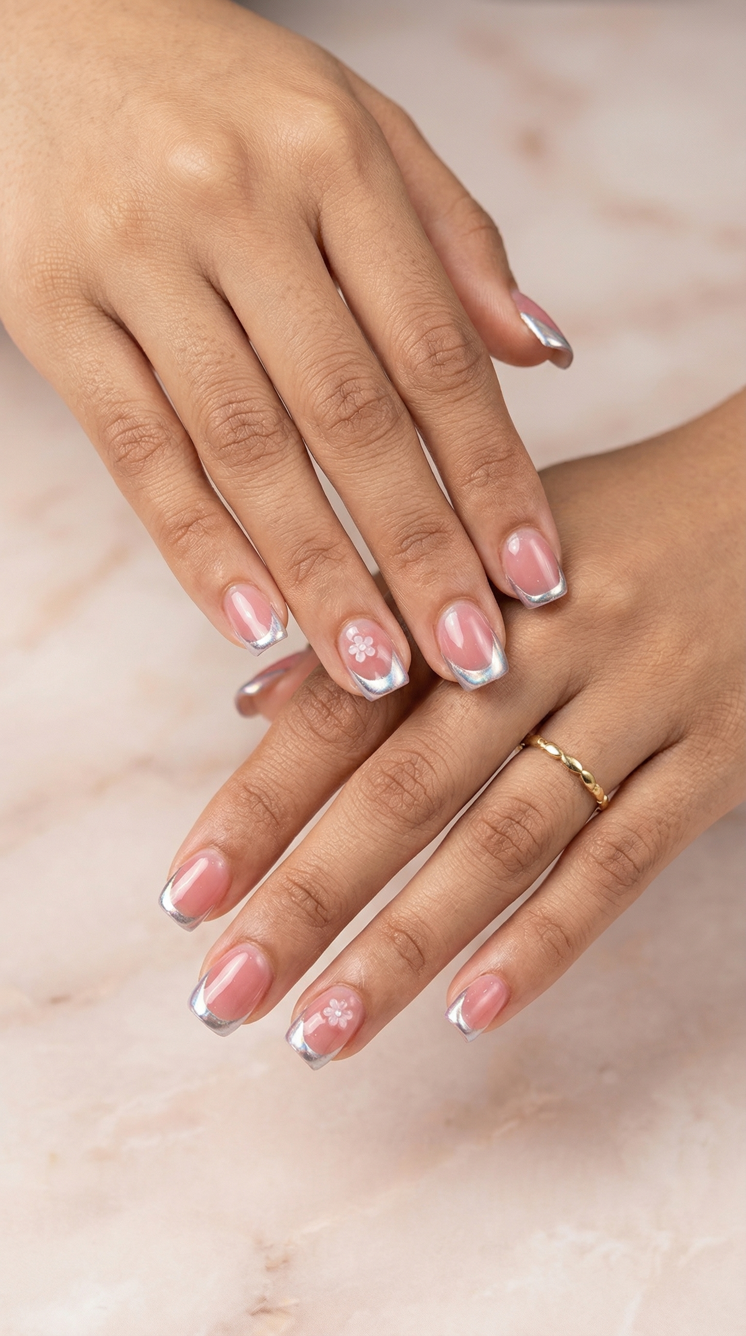 Detail closeup of soft glam French tips